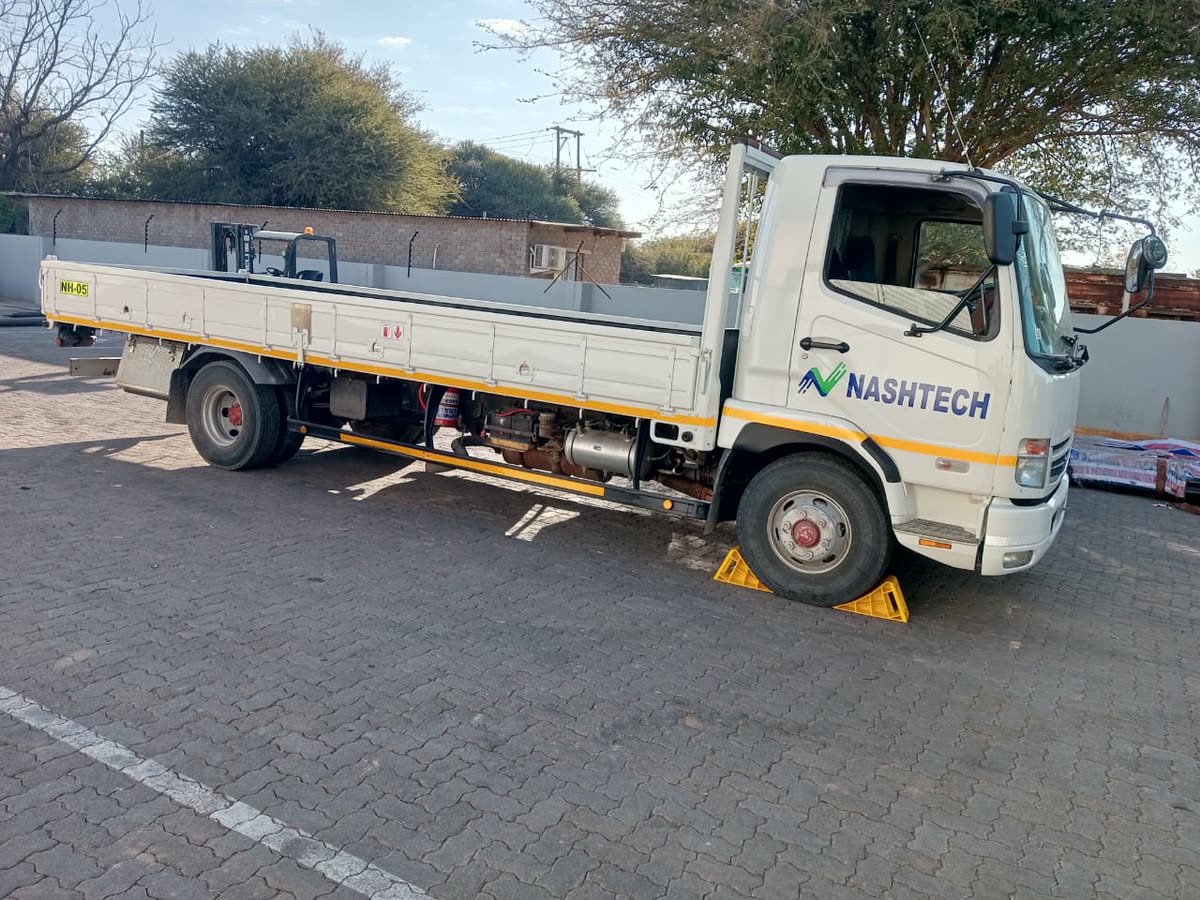Nashtech delivery truck loaded with conveyor equipment at the yard